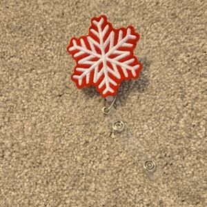 Red and White Snowflake Badge Reel